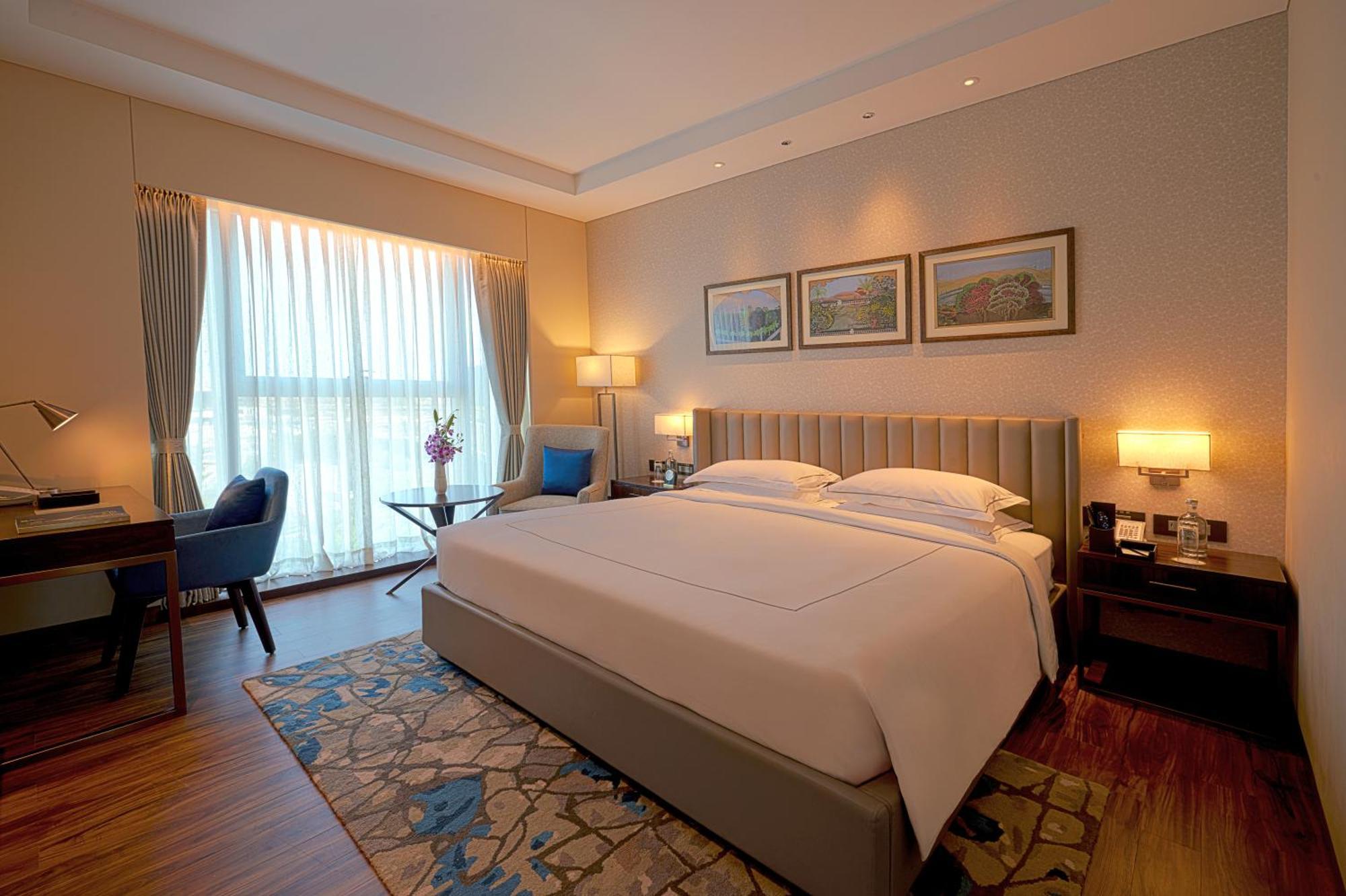 Taj Bangalore Devanahalli Zewnętrze zdjęcie A bedroom at the Taj Bengal